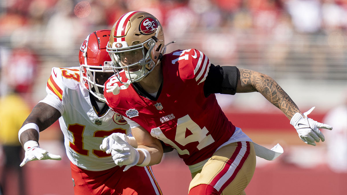 San Francisco 49ers wide receiver Ricky Pearsall (14) runs against Kansas City Chiefs safety Nazeeh Johnson (13) during the first quarter at Levi's Stadium.