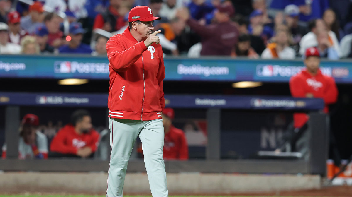 Philadelphia Phillies manager Rob Thomson (59) walks to the mound in the seventh inning against the New York Mets during game three of the NLDS for the 2024 MLB Playoffs at Citi Field.