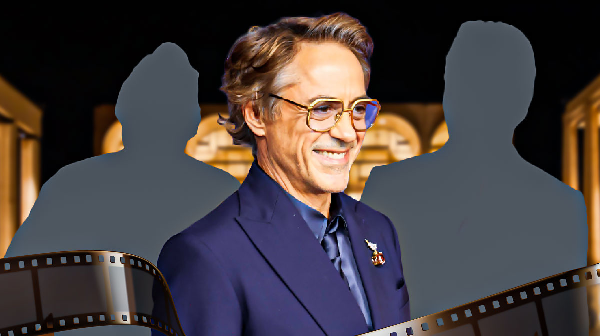 Marvel star Robert Downey Jr in front of Lincoln Center, where he performs in his Broadway debut, with silhouettes of Avengers: Endgame directors Joe and Anthony Russo (the Russo brothers).