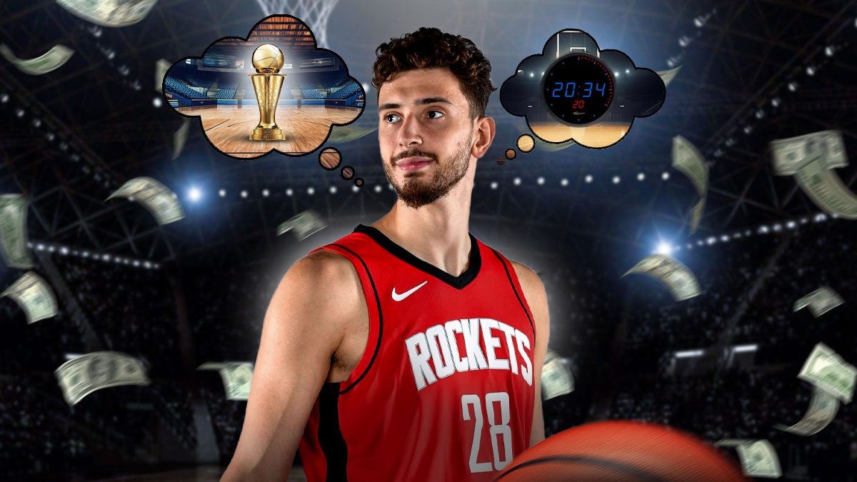 Rockets' Alperen Sengun with money falling thinking of NBA Finals and clock.