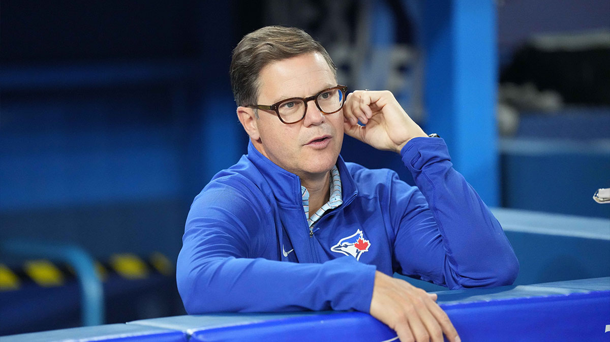 Toronto Blue Jays general manager Ross Atkins talks with the media during batting practice against the San Francisco Giants at Rogers Centre. 