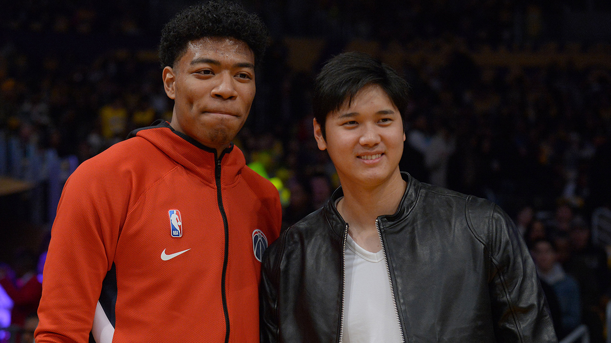 Washington Wizards forward Rui Hachimura (8) poses for a photo with Los Angeles Angels player Shohei Ohtani at Staples Center.