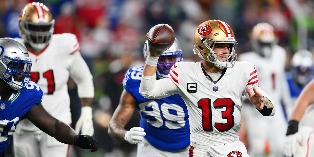 San Francisco 49ers quarterback Brock Purdy (13) passes the ball against the Seattle Seahawks during the second half at Lumen Field. 