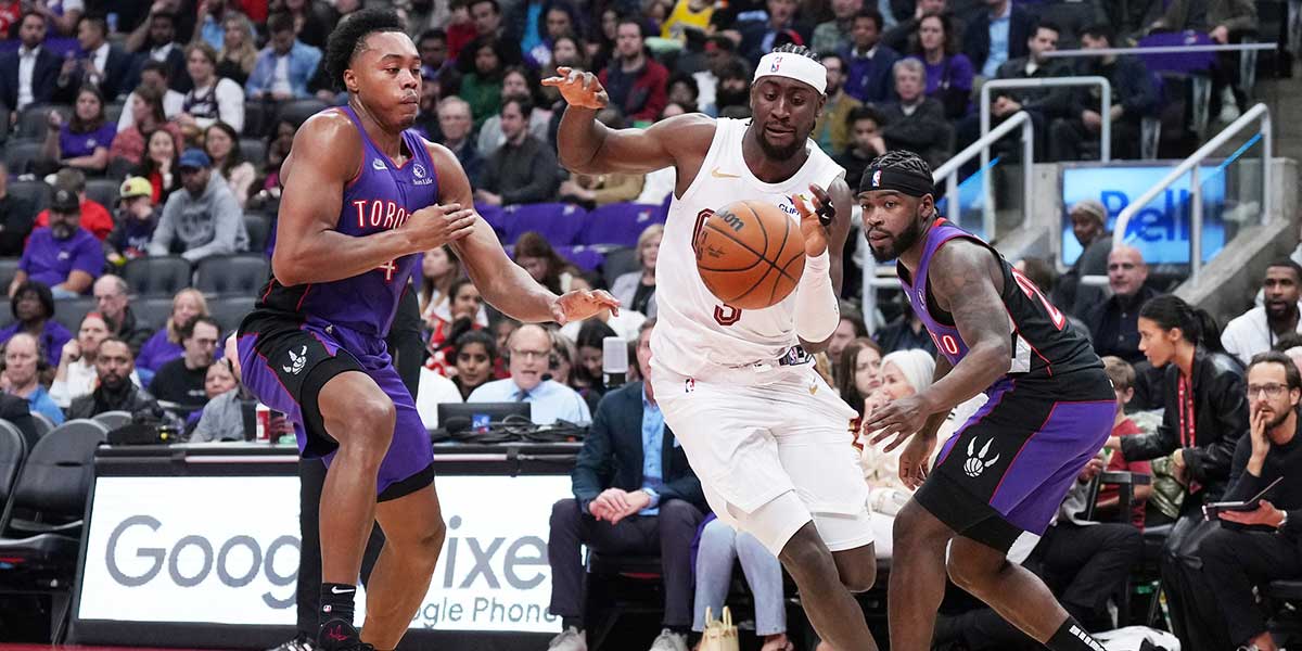 Cleveland Cavaliers guard Caris LeVert (3) drives to the basket as Toronto Raptors forward Scottie Barnes (4) tries to defend during the third quarter at Scotiabank Arena.