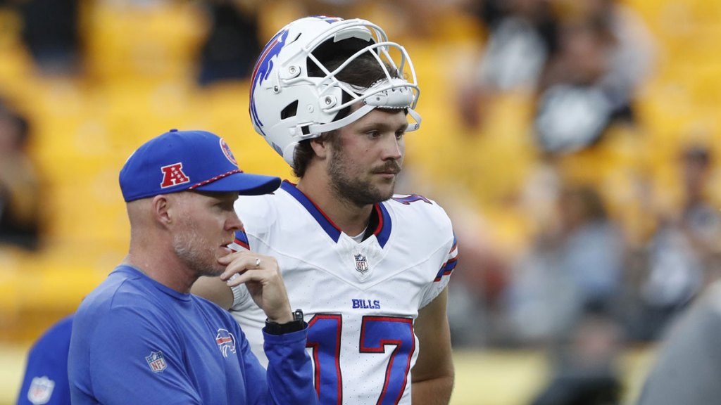 Buffalo Bills head coach Sean McDermott (left) and quarterback Josh Allen (17) talk on the field before the game against the Pittsburgh Steelers at Acrisure Stadium. 