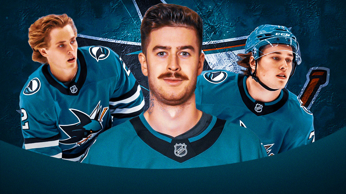 macklin celebrini, will smith, and yaroslav askarov in front of sharks logo and ice rink.