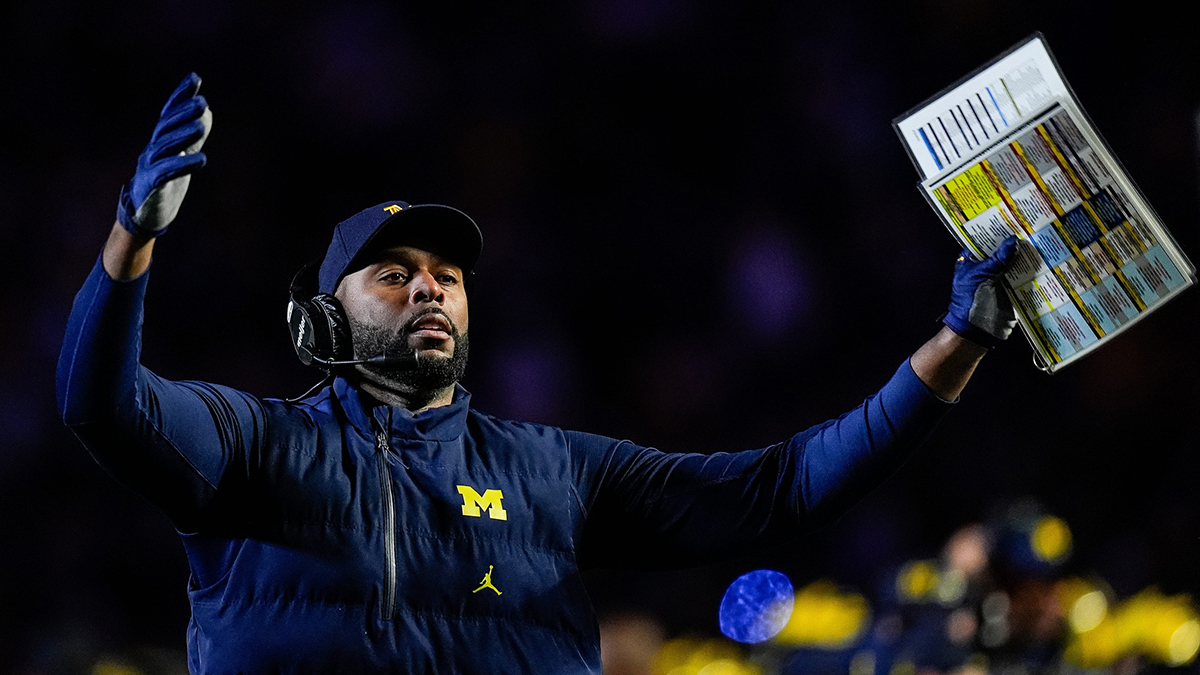 Michigan head coach Sherrone Moore celebrates a touchdown against Michigan State during the second half at Michigan Stadium