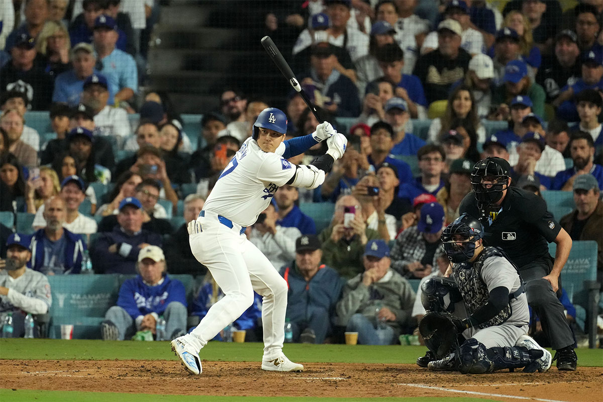 Los Angeles Dodgers designated hitter Shohei Ohtani (17) bats against the New York Yankees in the seventh inning for game two of the 2024 MLB World Series at Dodger Stadium.
