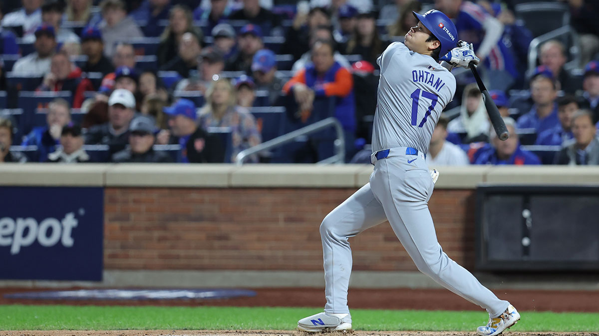 Oct 18, 2024; New York City, New York, USA; Los Angeles Dodgers two-way player Shohei Ohtani (17) hits a single in the fourth inning against the New York Mets during game five of the NLCS for the 2024 MLB playoffs at Citi Field. 