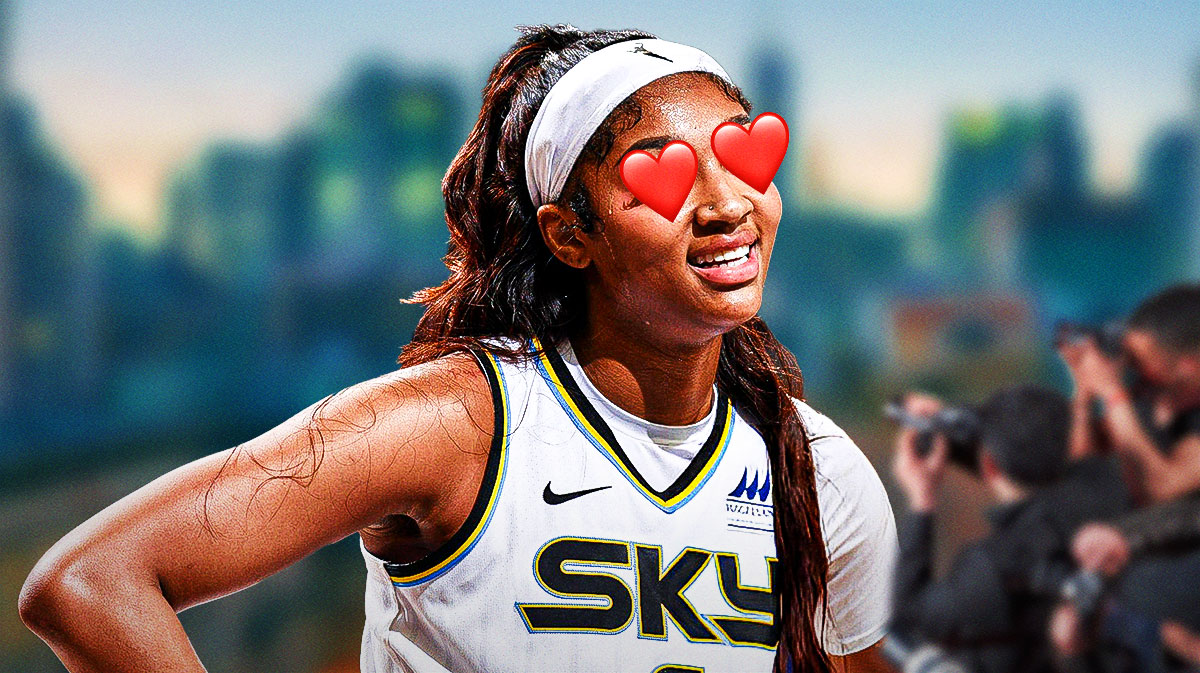 Sky's Angel Reese looks at Liberty fans with New York Skyline in background