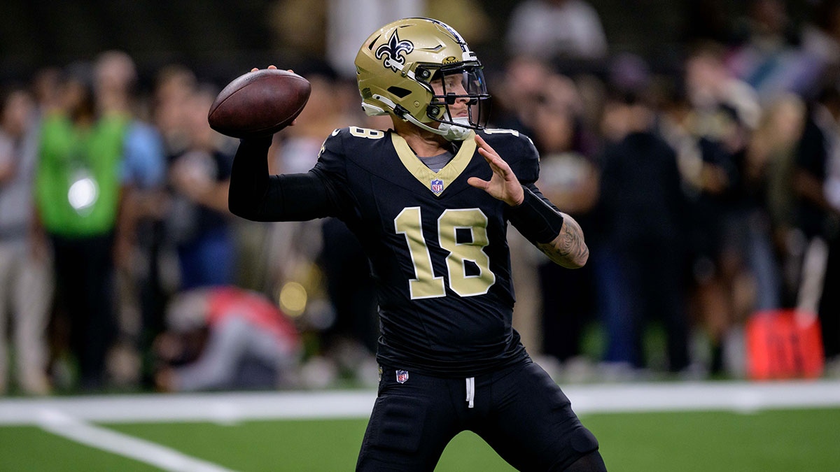 New Orleans Saints quarterback Spencer Rattler (18) warms up before a game against the Tampa Bay Buccaneers at Caesars Superdome.