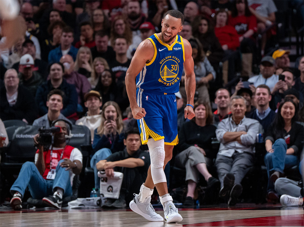 Golden State Warriors point guard Stephen Curry (30) reacts during the second half against the Portland Trailblazers at Moda Center.
