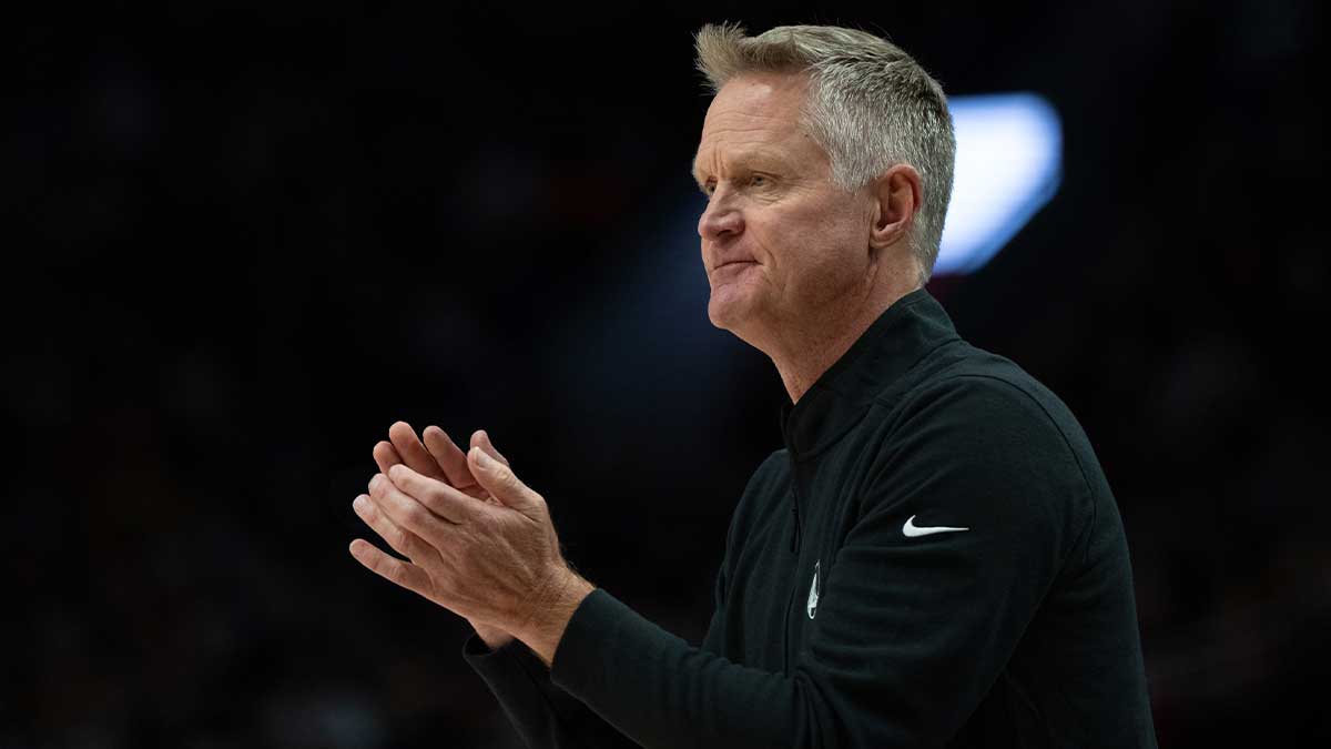 Golden State Warriors head coach Steve Kerr claps during the first half against the Portland Trailblazers at Moda Center. 