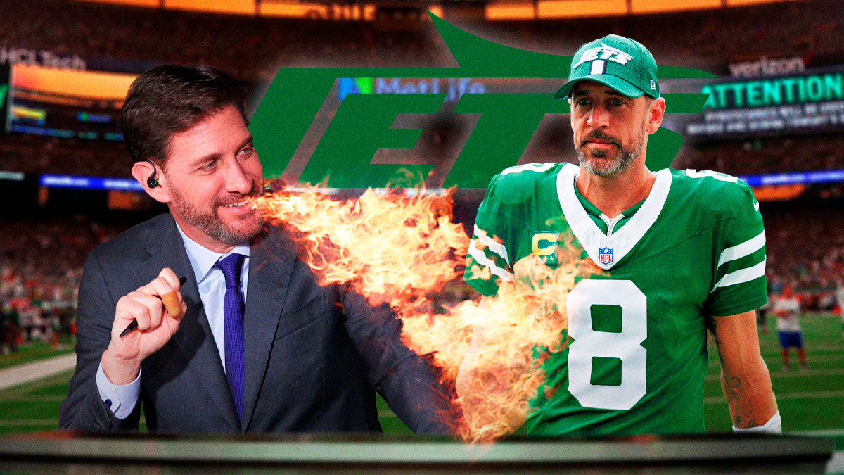 ESPN host Mike Greenberg with fire coming out of his mouth, with a photo of New York Jets quarterback Aaron Rodgers next to him, as well as the New York Jets logo