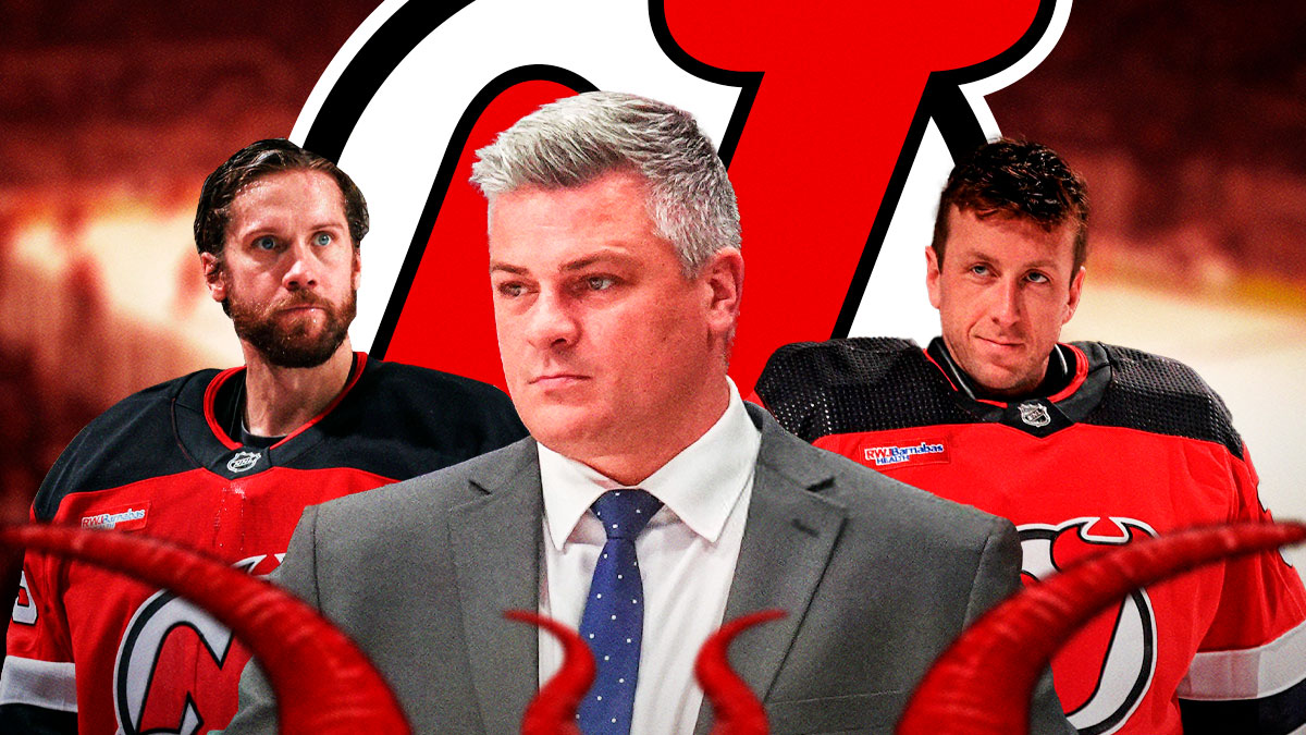 Sheldon Keefe in middle looking stern, Jacob Markstrom and Jake Allen on either side looking stern, New Jersey Devils logo, hockey rink in background