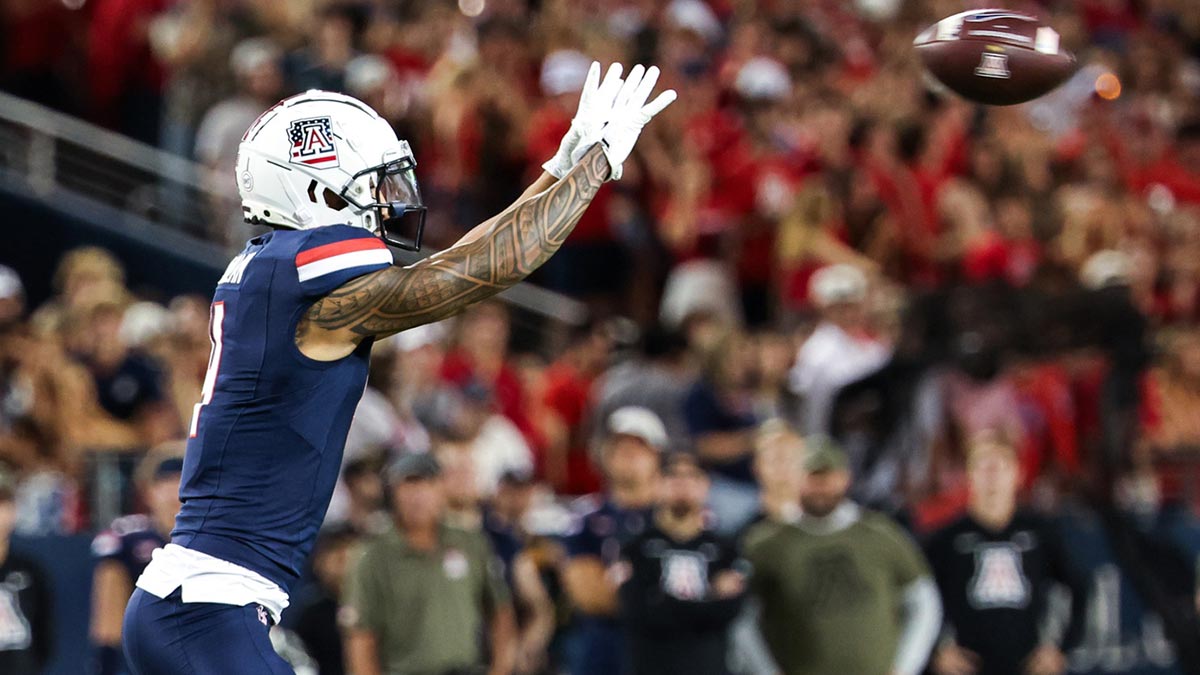 Oct 5, 2024; Tucson, Arizona, USA; Arizona Wildcats wide receiver Tetairoa McMillan (4) catches the ball during second quarter against Texas Tech Red Raiders at Arizona Stadium. Mandatory Credit: Aryanna Frank-Imagn Images