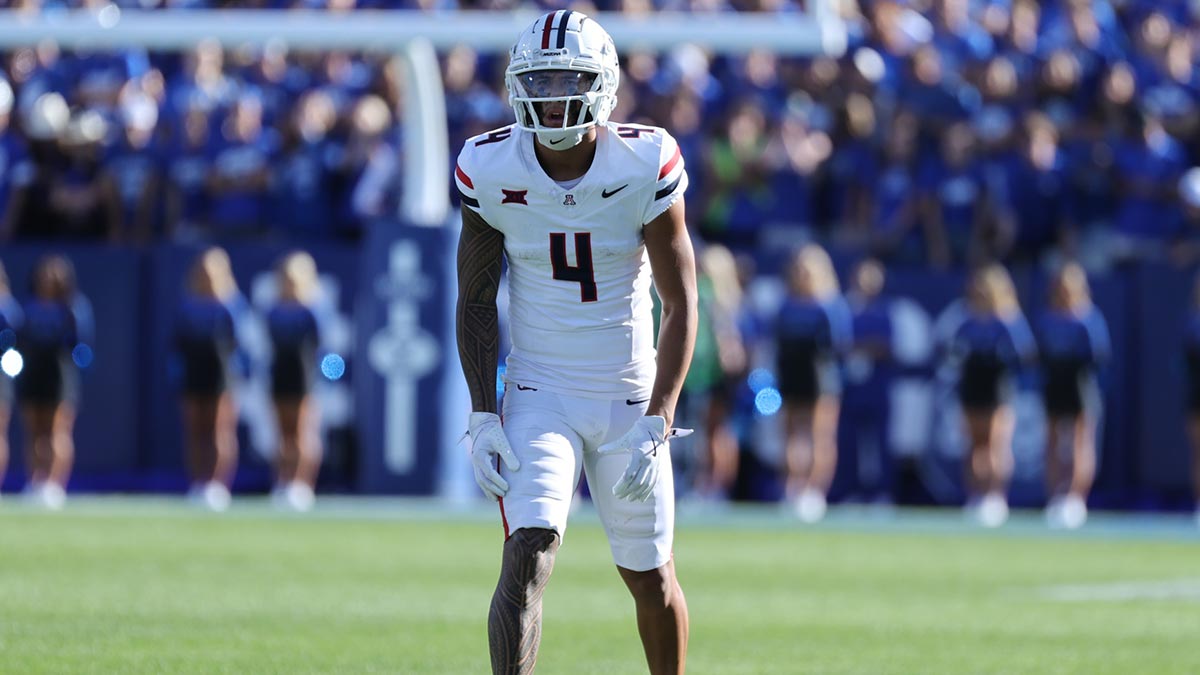 Oct 12, 2024; Provo, Utah, USA; Arizona Wildcats wide receiver Tetairoa McMillan (4) gets ready for a play against the Brigham Young Cougars during the third quarter at LaVell Edwards Stadium. Mandatory Credit: Rob Gray-Imagn Images