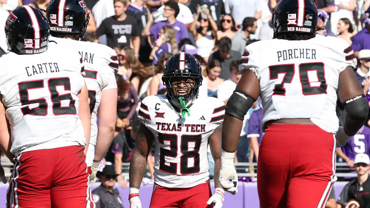 Texas Tech Red Raiders running back Tahj Brooks (28) celebrates after scoring a touchdown against the TCU Horned Frogs in the second quarter at Amon G. Carter Stadium. 