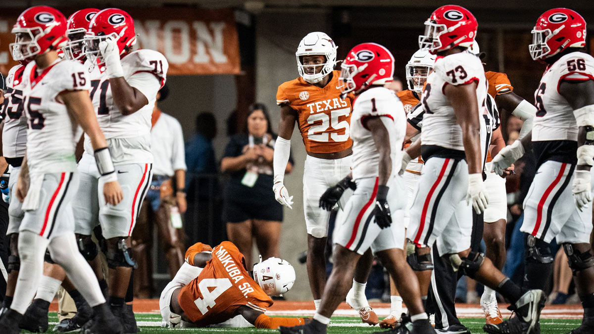 Texas Longhorns defensive back Andrew Mukuba (4) goes down with an injury in the fourth quarter of the Longhorns' game against the Georgia Bulldogs at Darrell K. Royal Texas Memorial Stadium in Austin.