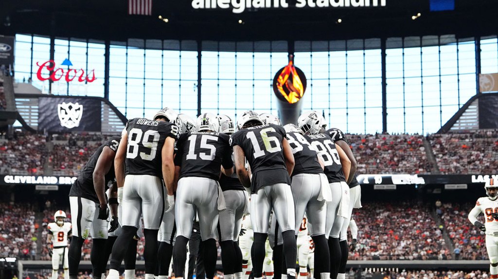 The Las Vegas Raiders huddle up before a play against the Cleveland Browns during the third quarter at Allegiant Stadium.