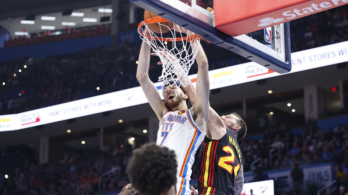 Thunder forward Chet Holmgren (7) dunks against Atlanta Hawks guard Garrison Mathews (24) during the second half at Paycom Center