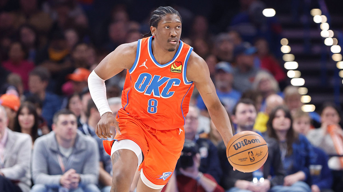 Oklahoma City Thunder forward Jalen Williams (8) dribbles the ball down the court against the Portland Trail Blazers during the second half at Paycom Center.