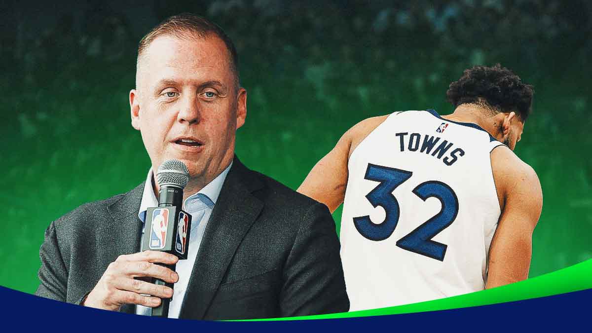 Tim Connelly with his back turned to Karl-Anthony Towns