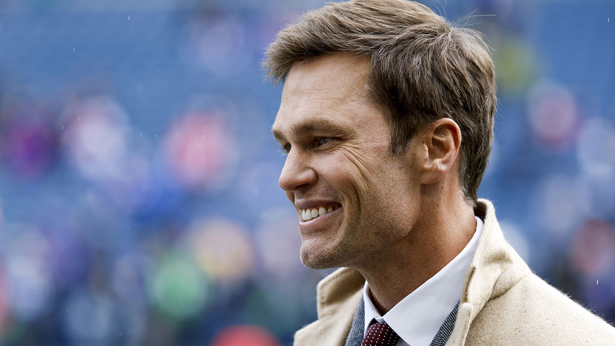 FOX commentator Tom Brady stands on the sideline before a game between the Seattle Seahawks and Buffalo Bills at Lumen Field. 