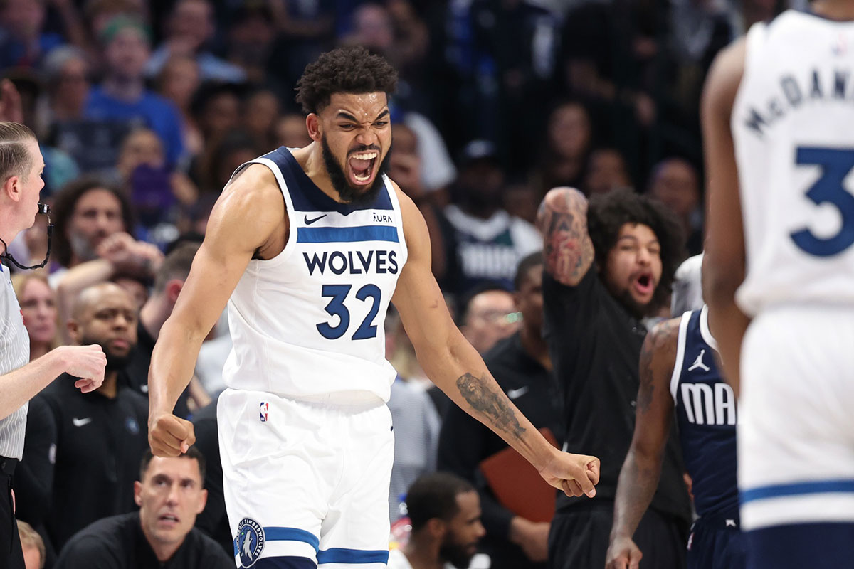 Minnesota Timberwolves center Karl-Anthony Towns (32) reacts during the fourth quarter against the Dallas Mavericks in game four of the western conference finals for the 2024 NBA playoffs at American Airlines Center