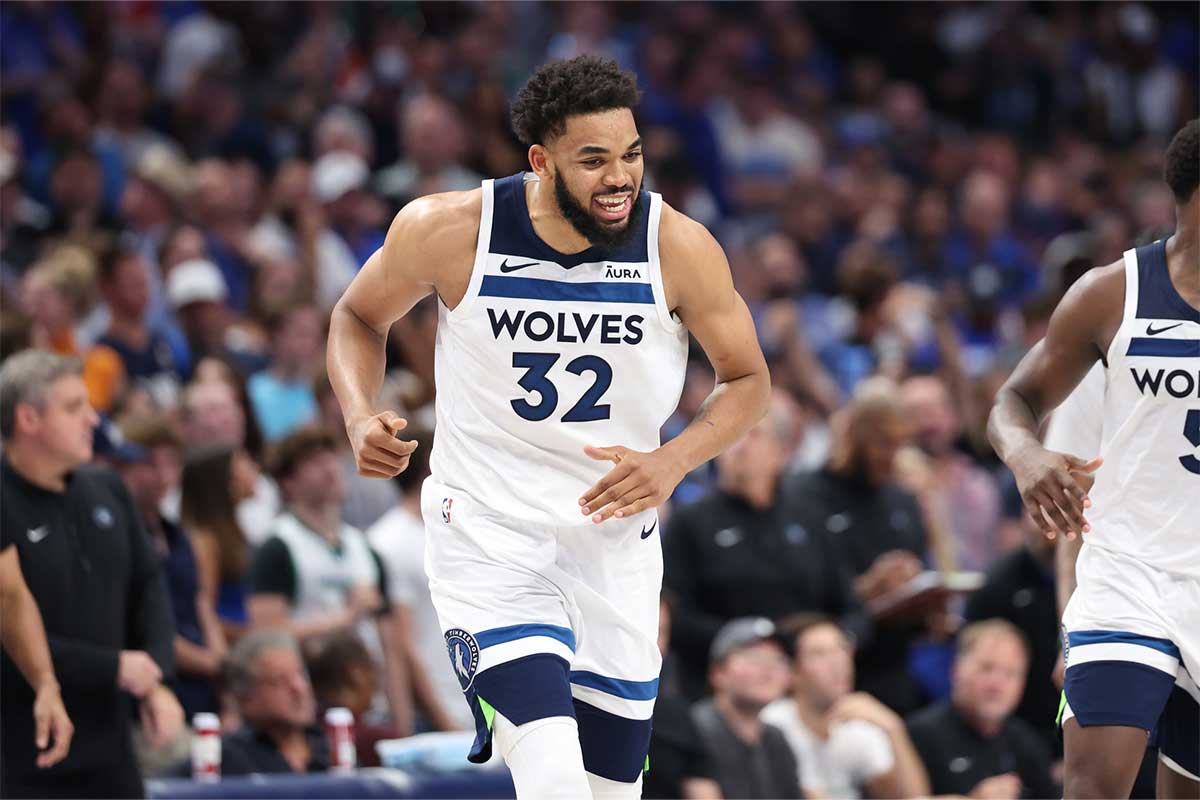 Minnesota Timberwolves center Karl-Anthony Towns (32) reacts against the Dallas Mavericks during the fourth quarter of game four of the western conference finals for the 2024 NBA playoffs at American Airlines Center