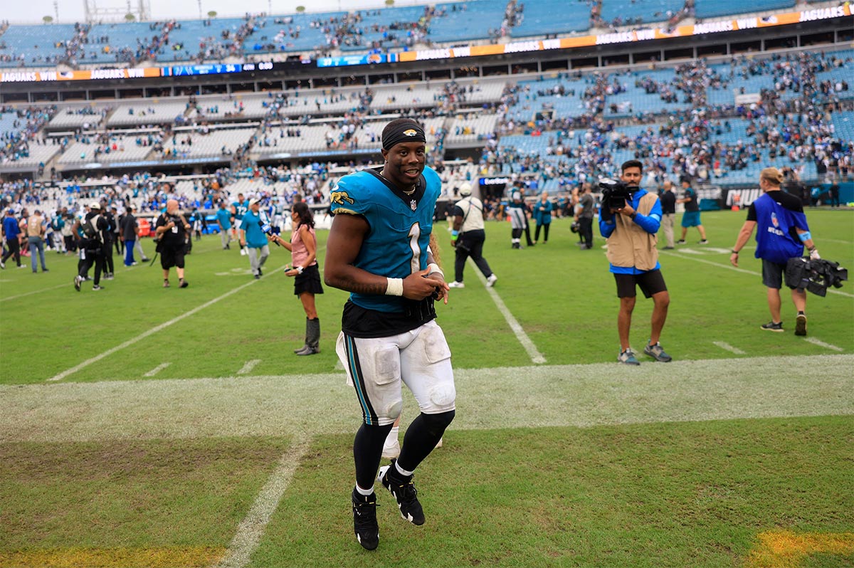 Jacksonville Jaguars running back Travis Etienne Jr. (1) runs off the field after an NFL football matchup Sunday, Oct. 6, 2024 at EverBank Stadium in Jacksonville, Fla.