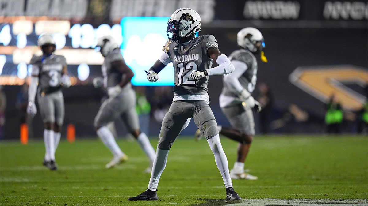Colorado Buffaloes cornerback Travis Hunter (12) reacts to a play in the second quarter against the Cincinnati Bearcats at Folsom Field.