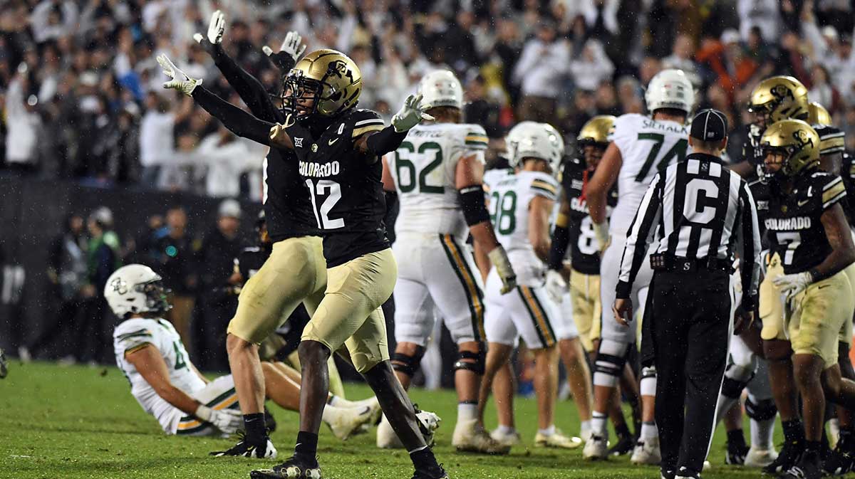 Colorado Buffaloes wide receiver Travis Hunter (12) celebrates with teammates after a missed field goal by the Baylor Bears during the second half at Folsom Field.