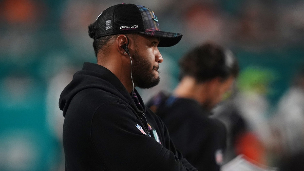 Miami Dolphins quarterback Tua Tagovailoa stands on the sidelines during the second half against the Tennessee Titans at Hard Rock Stadium.