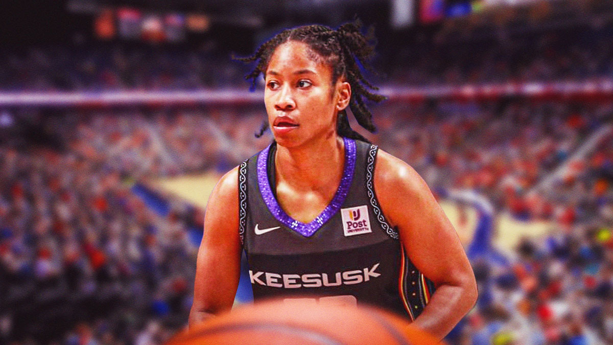 Connecticut Sun player Tyasha Harris with the Connecticut Sun arena in the background, Lynx WNBA Playoffs