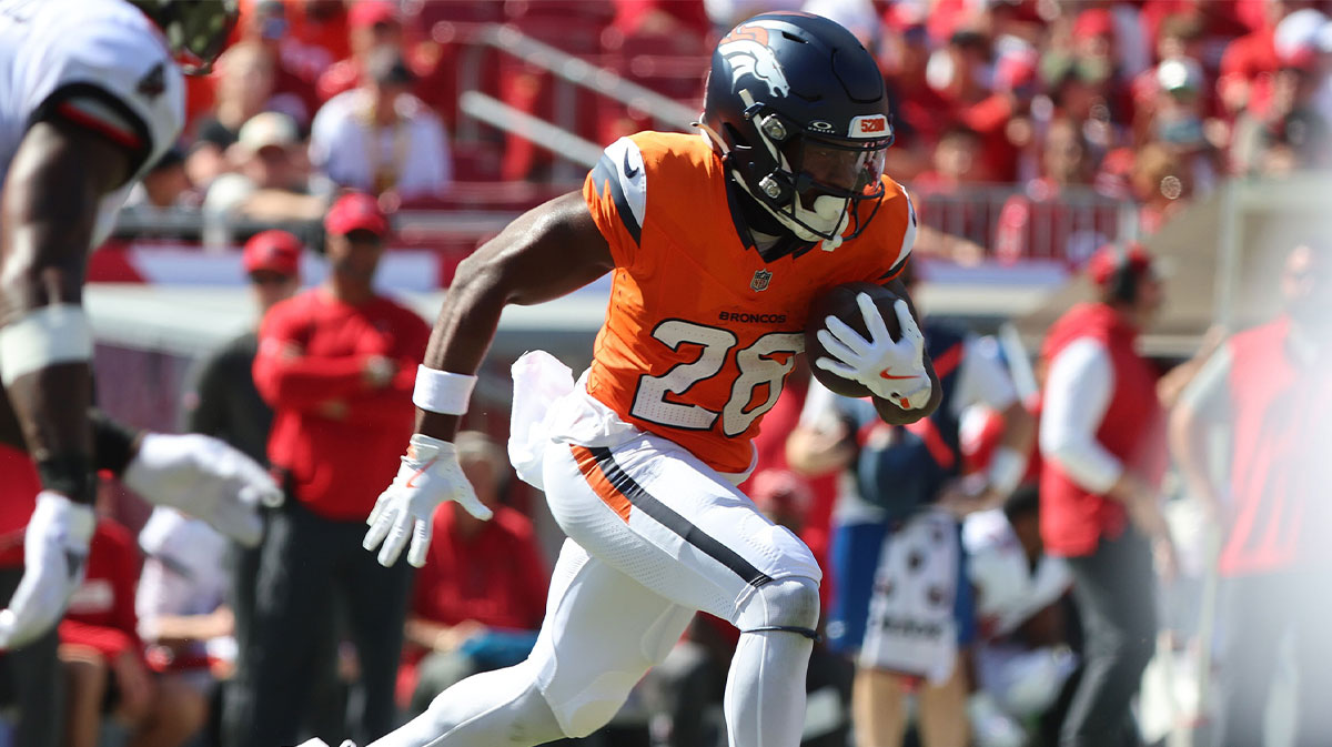 Sep 22, 2024; Tampa, Florida, USA; Denver Broncos running back Tyler Badie (28) runs with the ball against the Tampa Bay Buccaneers during the second half at Raymond James Stadium.