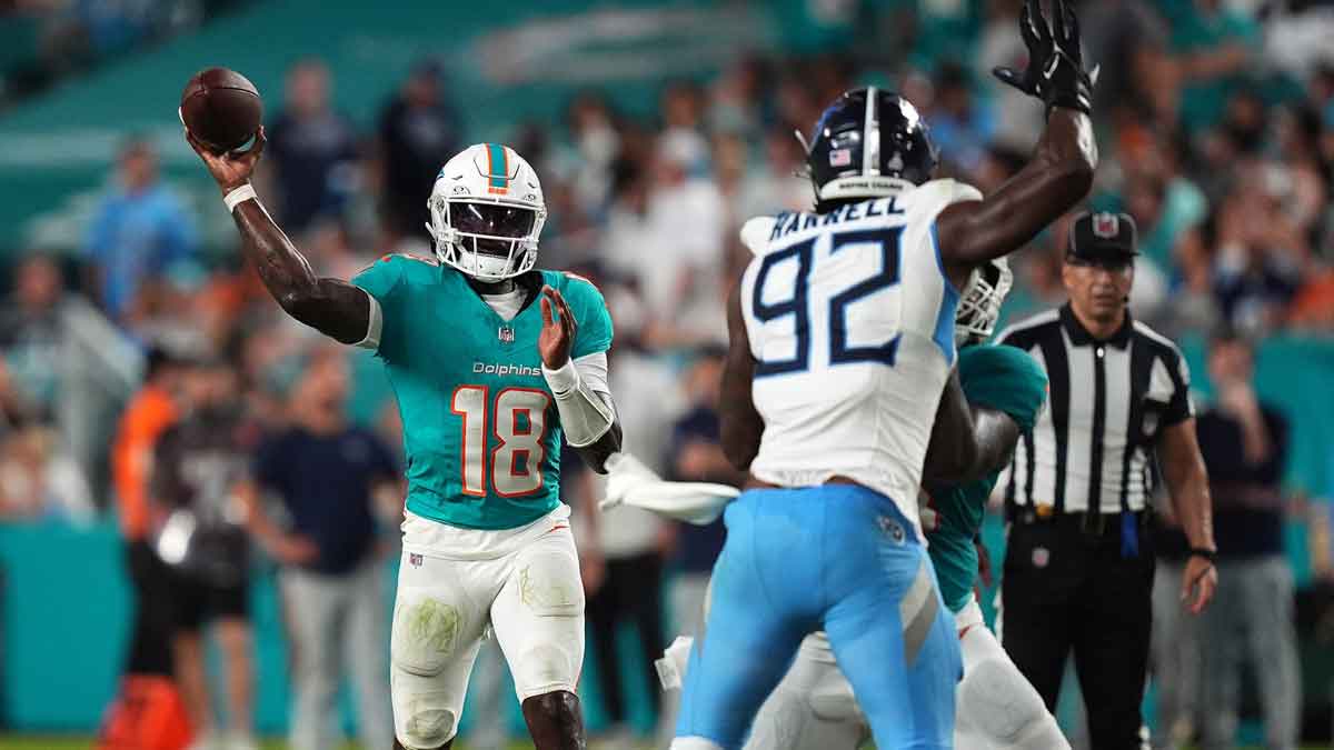 Miami Dolphins quarterback Tyler Huntley (18) attempts a pass against the Tennessee Titans during the second half at Hard Rock Stadium. 