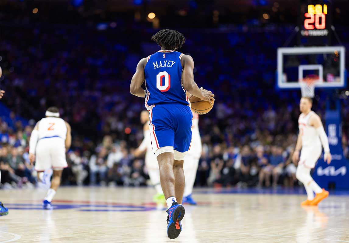 Philadelphia 76ers guard Tyrese Maxey (0) brings the ball up court against the New York Knicks during game six of the first round for the 2024 NBA playoffs at Wells Fargo Center.