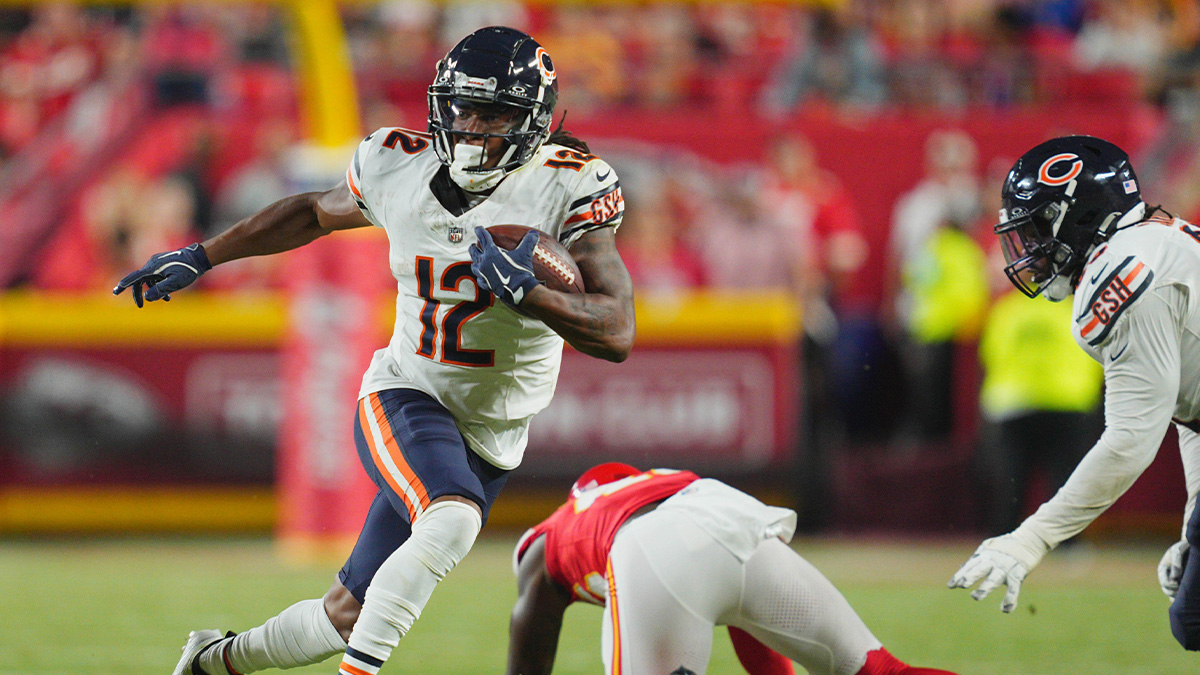 Aug 22, 2024; Kansas City, Missouri, USA; Chicago Bears wide receiver Velus Jones Jr. (12) runs for a touchdown against Kansas City Chiefs safety Tyree Gillespie (46) during the second half at GEHA Field at Arrowhead Stadium.