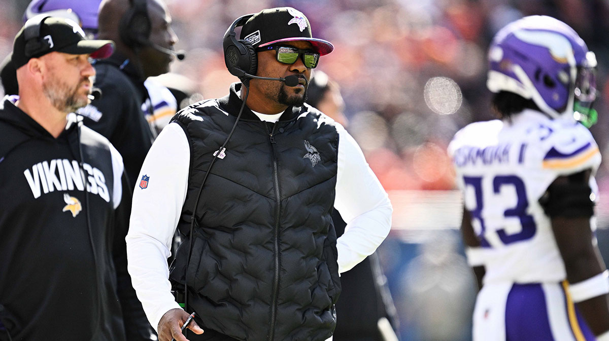 Former Miami Dolphins and Minnesota Vikings defensive coordinator Brian Flores watches his team play against the Chicago Bears at Soldier Field.