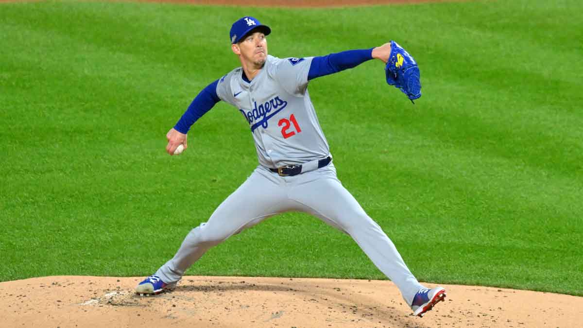 Los Angeles Dodgers pitcher Walker Buehler (21) throws a pitch against the New York Mets in the first inning during game three of the NLCS for the 2024 MLB playoffs at Citi Field.