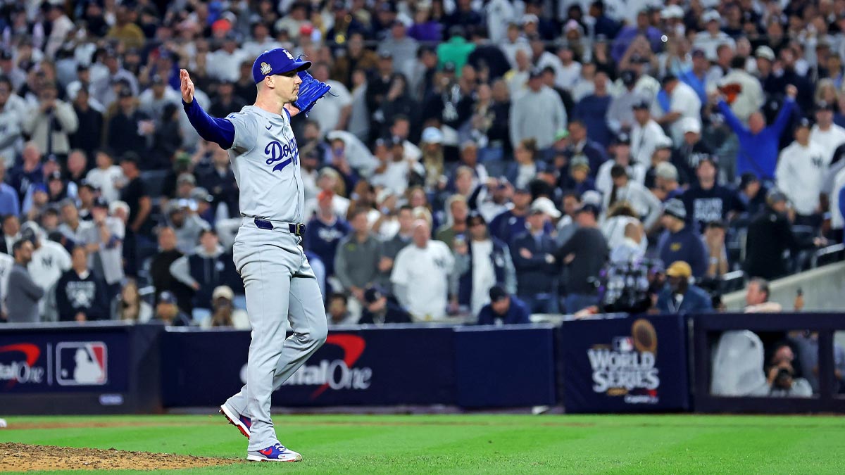 Los Angeles Dodgers pitcher Walker Buehler (21) celebrates after beating the New York Yankees in game four to win the 2024 MLB World Series at Yankee Stadium.