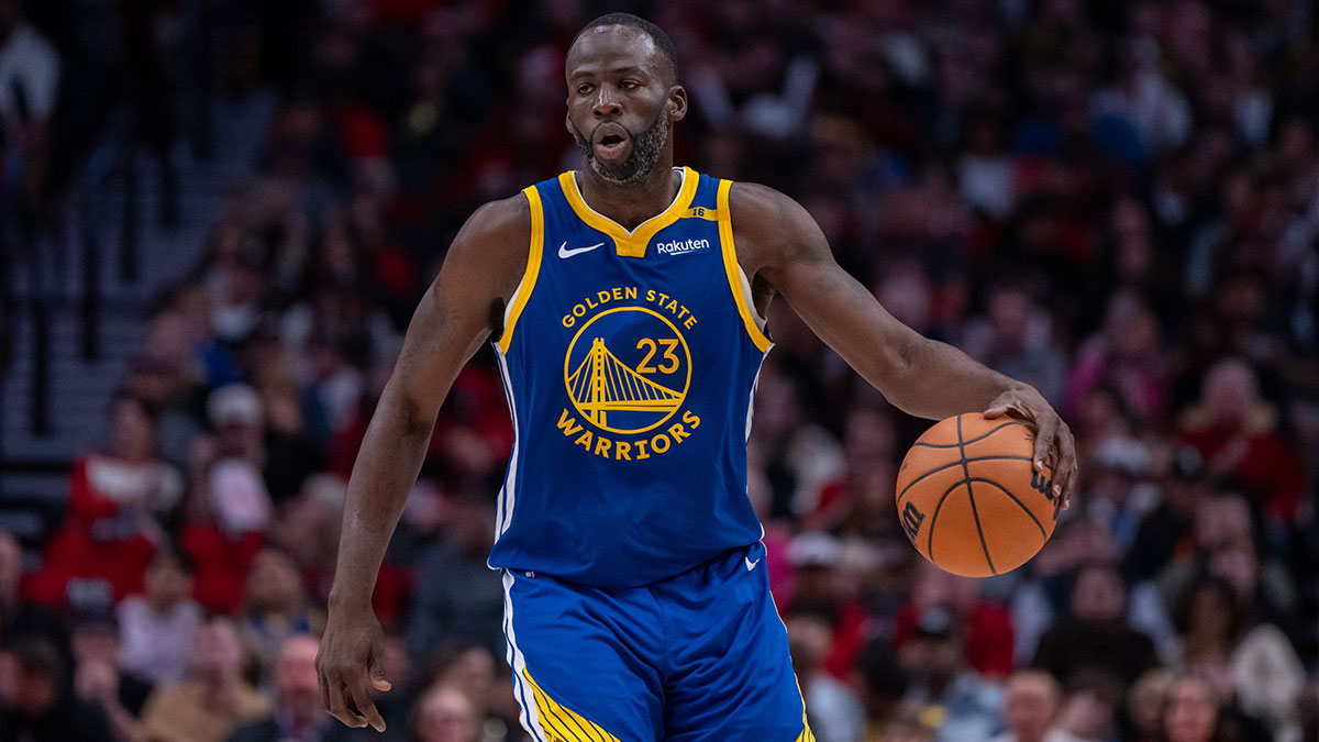 Golden State Warriors power forward Draymond Green (23) dribbles the ball against the Portland Trailblazers during the second half at Moda Center