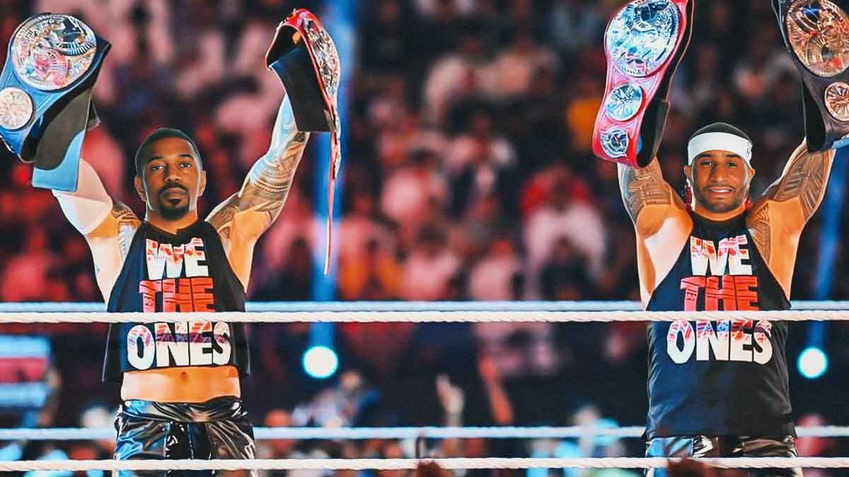 Warriors' De'Anthony Melton and Gary Payton II photoshopped as The Usos (WWE) holding the Undisputed WWE Tag Team Championship in 2022