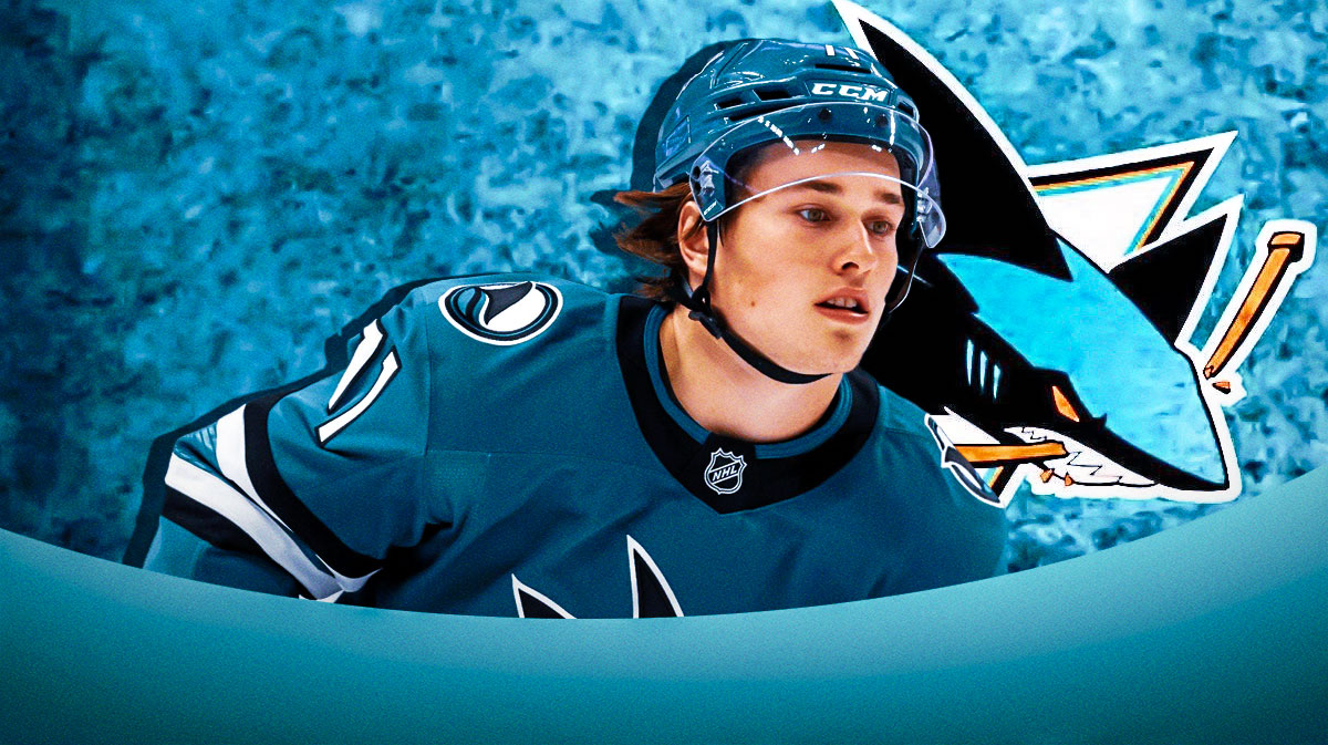 Macklin Celebrini looking hopeful, San Jose Sharks logo, hockey rink in background