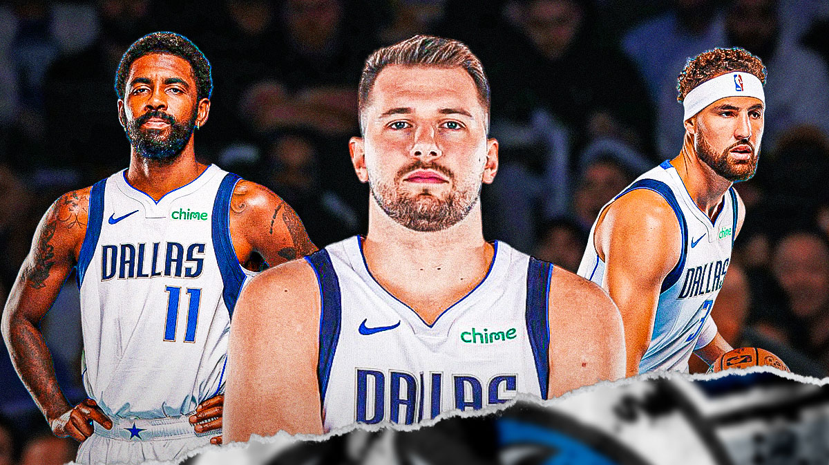 Mavericks Luka Doncic, Mavericks Kyrie Irving and Mavericks Klay Thompson all sitting down on an NBA sideline.