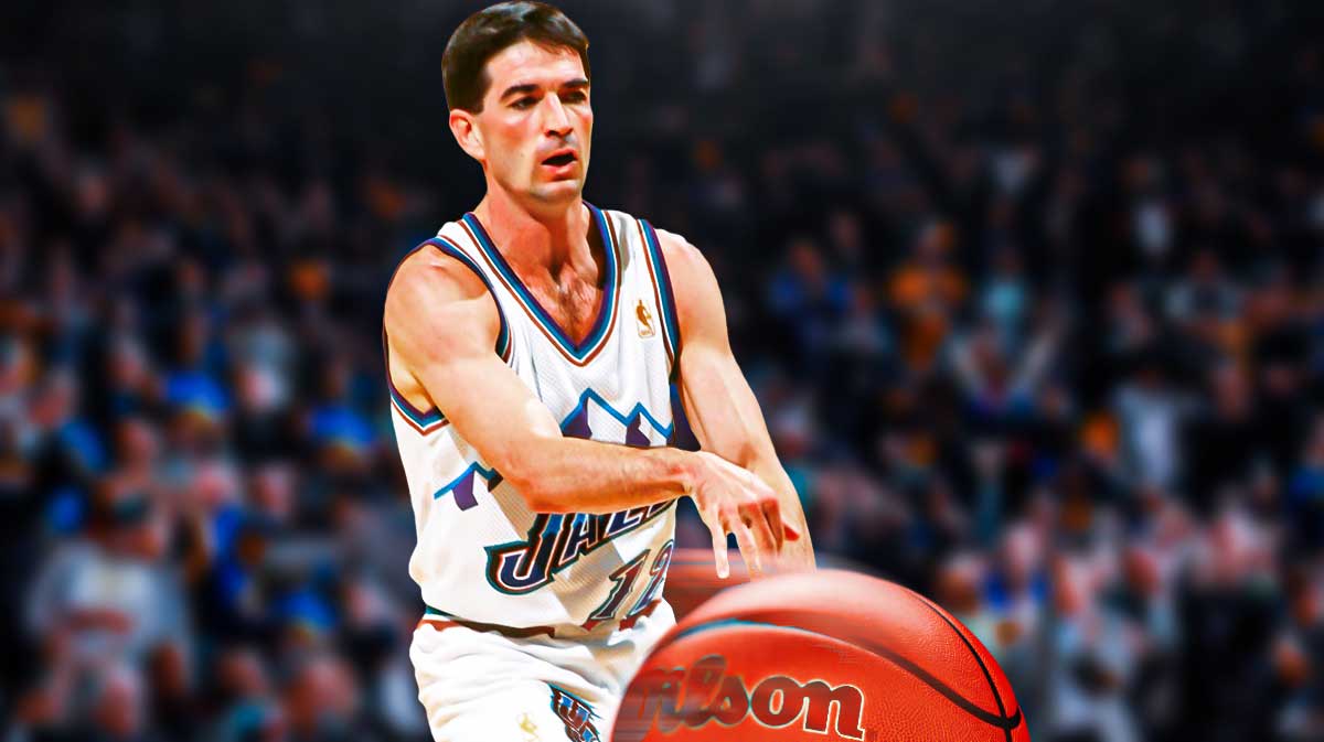 Jazz player John Stockton, the NBA all-time assists leader, passing the ball