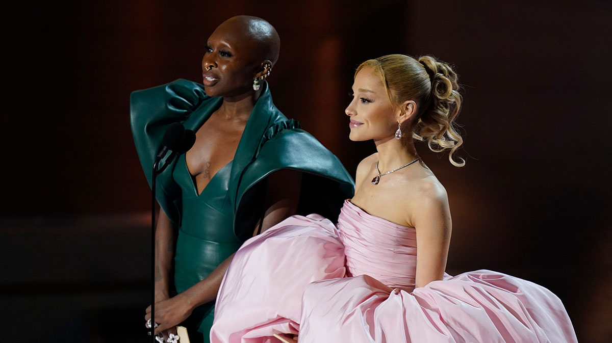 Wicked stars Cynthia Erivo and Ariana Grande presenting at the Oscars in 2024.