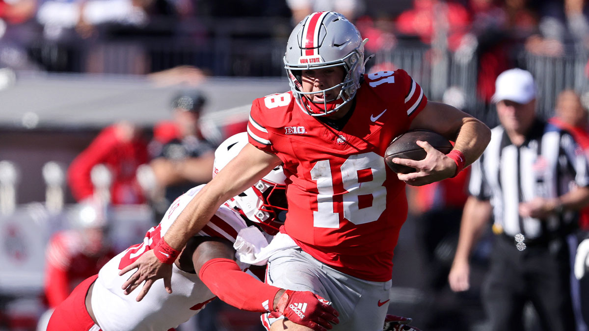 Ohio State Buckeyes quarterback Will Howard (18) runs for a first down during the fourth quarter against the Nebraska Cornhuskers at Ohio Stadium.