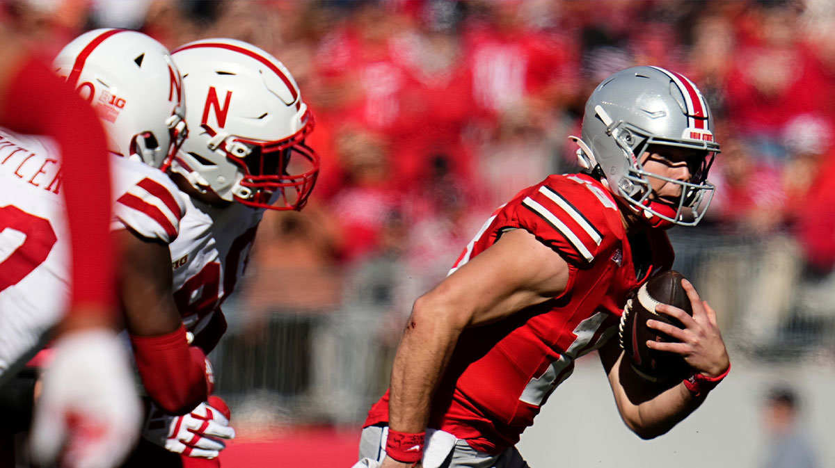 Ohio State Buckeyes quarterback Will Howard (18) scrambles away from pressure during the second half of the NCAA football game against the Nebraska Cornhuskers at Ohio Stadium